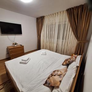 Ένα ή περισσότερα κρεβάτια σε δωμάτιο στο Alexander Residence