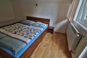 Posteľ alebo postele v izbe v ubytovaní Apartment Imka