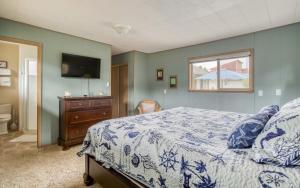 Ένα ή περισσότερα κρεβάτια σε δωμάτιο στο Ocean Breeze