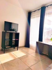 Et tv og/eller underholdning på Ferienwohnung Watzmann Nesterl