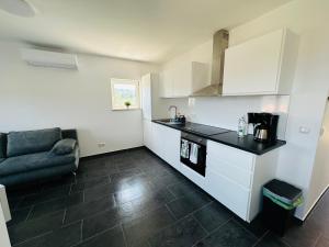 Køkken eller tekøkken på Robić Apartments 2 + 5 billeder