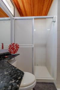 Ένα μπάνιο στο Habitación para 3 a una cuadra de la playa y bahía