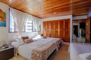 Ένα ή περισσότερα κρεβάτια σε δωμάτιο στο Habitación para 3 a una cuadra de la playa y bahía