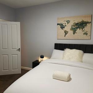 Ένα ή περισσότερα κρεβάτια σε δωμάτιο στο Argyleluxe