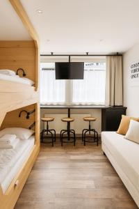 เตียงในห้องที่ TinyAlps