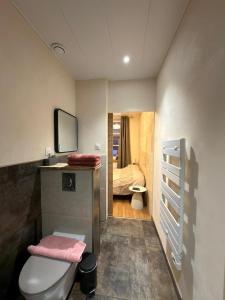 Ένα ή περισσότερα κρεβάτια σε δωμάτιο στο Bienvenue à Murélys