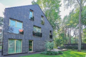 Κήπος έξω από το Simpsono Apartamentai