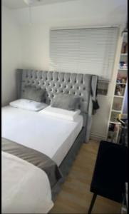 Ένα ή περισσότερα κρεβάτια σε δωμάτιο στο Flot Moderne Hus +2 φωτογραφίες