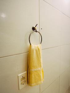 Фотография из галереи kitnet family - 2 quadras da praia da Enseada в городе Гуаружа