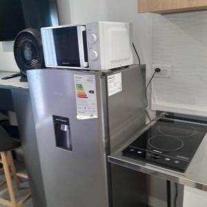 Kuchyň nebo kuchyňský kout v ubytování Entre Mareas