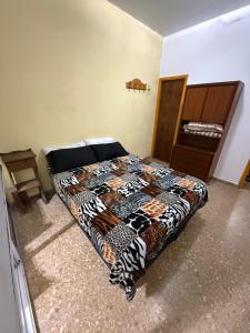 Ένα ή περισσότερα κρεβάτια σε δωμάτιο στο Departamento en San Bernardo