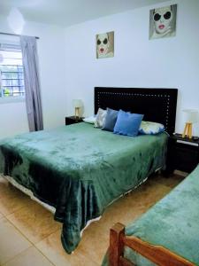 Postel nebo postele na pokoji v ubytování ENCANTO SERRANO