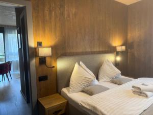 Ένα ή περισσότερα κρεβάτια σε δωμάτιο στο Apartmán Forest, Tatranská Štrba +8 φωτογραφίες