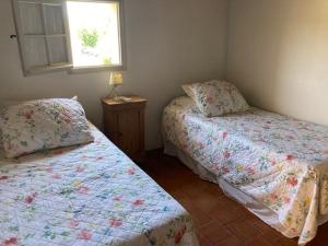 Postel nebo postele na pokoji v ubytování Mas du Panorama Panorama House