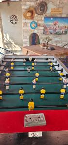 a pool table with a group of bees on it at Casa Amarilla Tecámac in Santa Cruz Tecamac