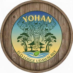 a wooden sign with the word yahana with an elephant at Yohan Eco Lodge Udawalawe in Udawalawe