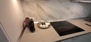 a room with a counter top with a room with a counter top at Appartamento Padova Chiesanuova in Padova +10 photos