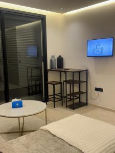 Un televizor și/sau centru de divertisment la Superbe T2 moderne au cœur du Maarif Confort & Style