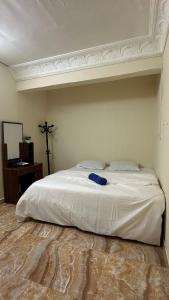 Postel nebo postele na pokoji v ubytování Furnished. Studio.apartment near Al ain mall