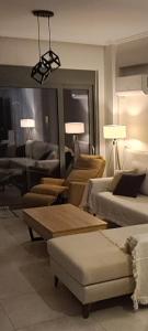 Posezení v ubytování Eleusis luxury flat 2