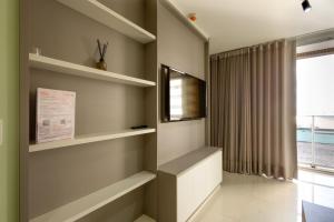 Et tv og/eller underholdning på Complexo DF PLAZA Shopping - Stay in Brasilia's best complex