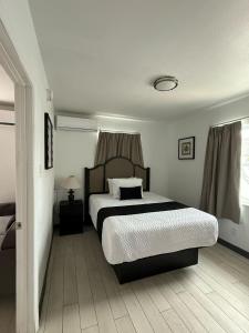 a bedroom with a large bed in a room at Holiday Isles Resort in St Pete Beach
