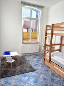 Postel nebo postele na pokoji v ubytování Familienfreundliche Ferienwohnung Sonnenhut