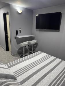 Μια τηλεόραση ή/και κέντρο ψυχαγωγίας στο Apartaestudio