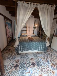 En eller flere senge i et værelse på Seafront Flat