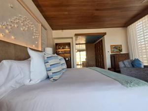 Ένα ή περισσότερα κρεβάτια σε δωμάτιο στο Sea Horizons