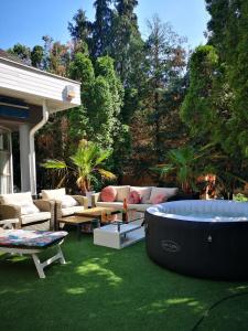 Zahrada ubytování Ház a Tónál Villa Apartman