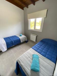 Ένα ή περισσότερα κρεβάτια σε δωμάτιο στο Villa las Marias