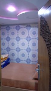 a room with a door and a wall with a wall at Dar Bouchikhi in Moulay Yacoub