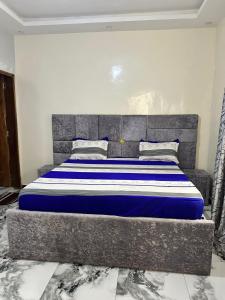 Ένα ή περισσότερα κρεβάτια σε δωμάτιο στο Badji