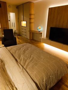 Ένα ή περισσότερα κρεβάτια σε δωμάτιο στο Metropolis apartment, parking, city center