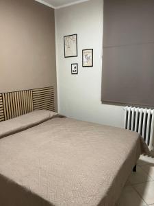 Ένα ή περισσότερα κρεβάτια σε δωμάτιο στο Appartamenti Castel Ritaldi Il Sagrantino