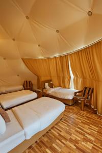 Postel nebo postele na pokoji v ubytování Mars rum camp