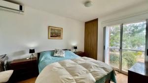 Ένα ή περισσότερα κρεβάτια σε δωμάτιο στο Apartamento En Las Delicias