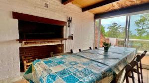 Μια τηλεόραση ή/και κέντρο ψυχαγωγίας στο Apartamento En Las Delicias