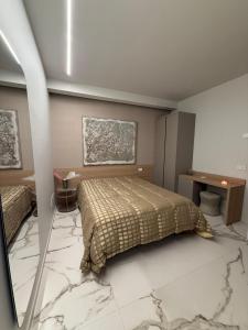 Ένα ή περισσότερα κρεβάτια σε δωμάτιο στο Porta Bari Rooms