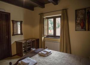 Postel nebo postele na pokoji v ubytování Hotel Palaghiaccio