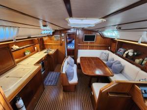 a view of the inside of a boat with a table at Jedrilica PERUN in Kravlja