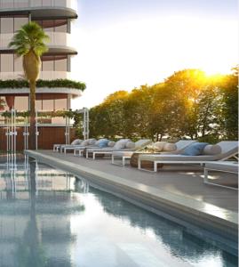 Πισίνα στο ή κοντά στο Luxury Beachside Apartment +14 φωτογραφίες