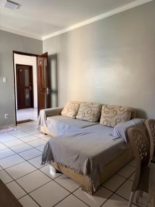 Giường trong phòng chung tại Apartamento Cohama São Luís