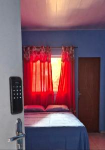 Ένα ή περισσότερα κρεβάτια σε δωμάτιο στο Casa do ViajanteBr