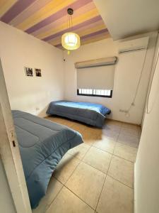 Postel nebo postele na pokoji v ubytování summer house