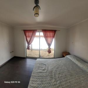 Ένα ή περισσότερα κρεβάτια σε δωμάτιο στο CABAÑAS SALTOS DEL LAJA Duende Lientur