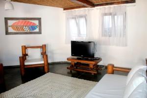 TV a/nebo společenská místnost v ubytování Rede Andrade Galeão