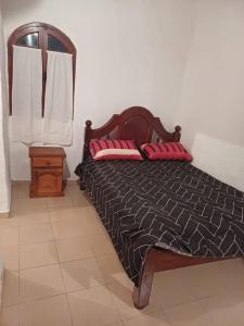 En eller flere senge i et værelse på Oasis casa Paso de la patria, Corrientes, Argentina + 8 billeder