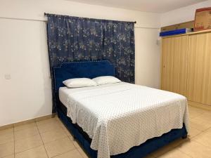 Ένα ή περισσότερα κρεβάτια σε δωμάτιο στο Sigma Theta Homes - KNUST Area